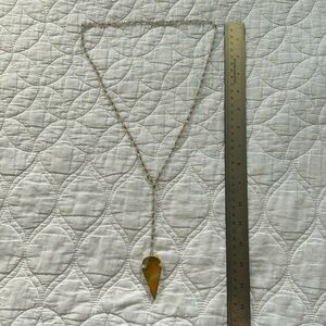 Yellow arrow Y necklace.